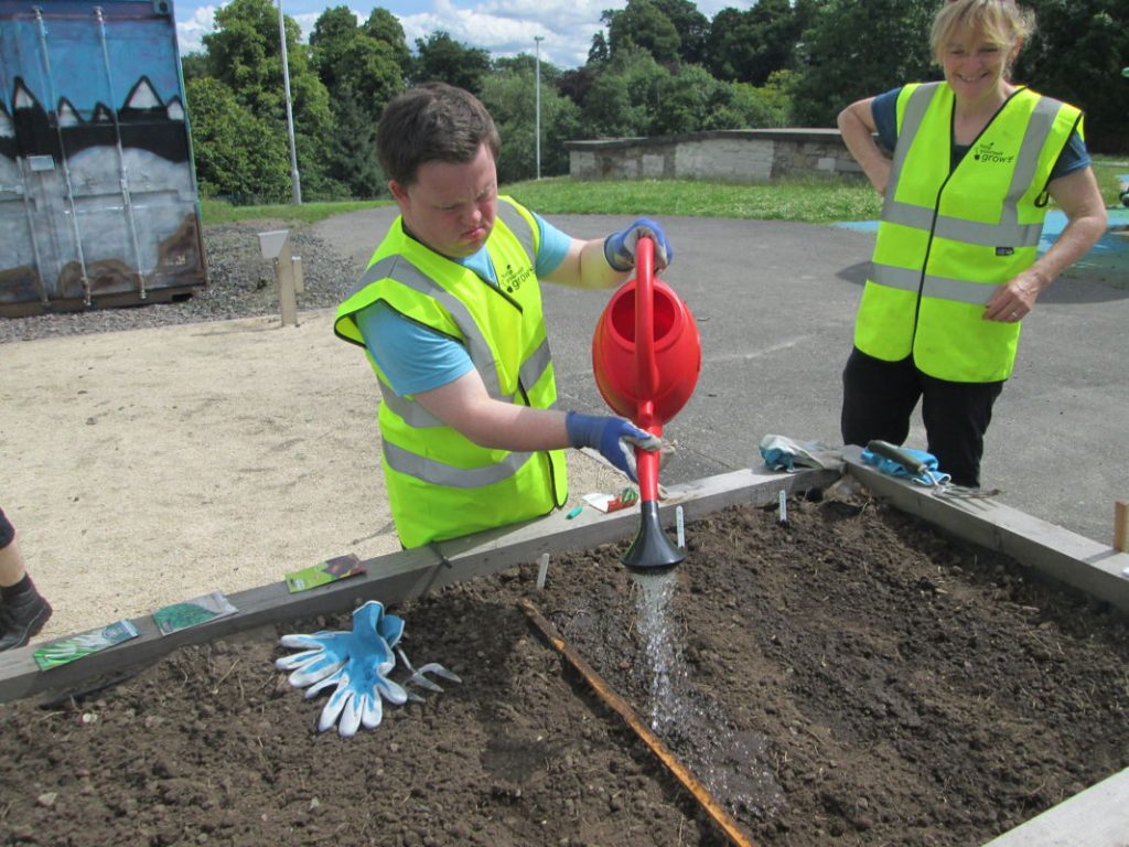 Paul watering the plants